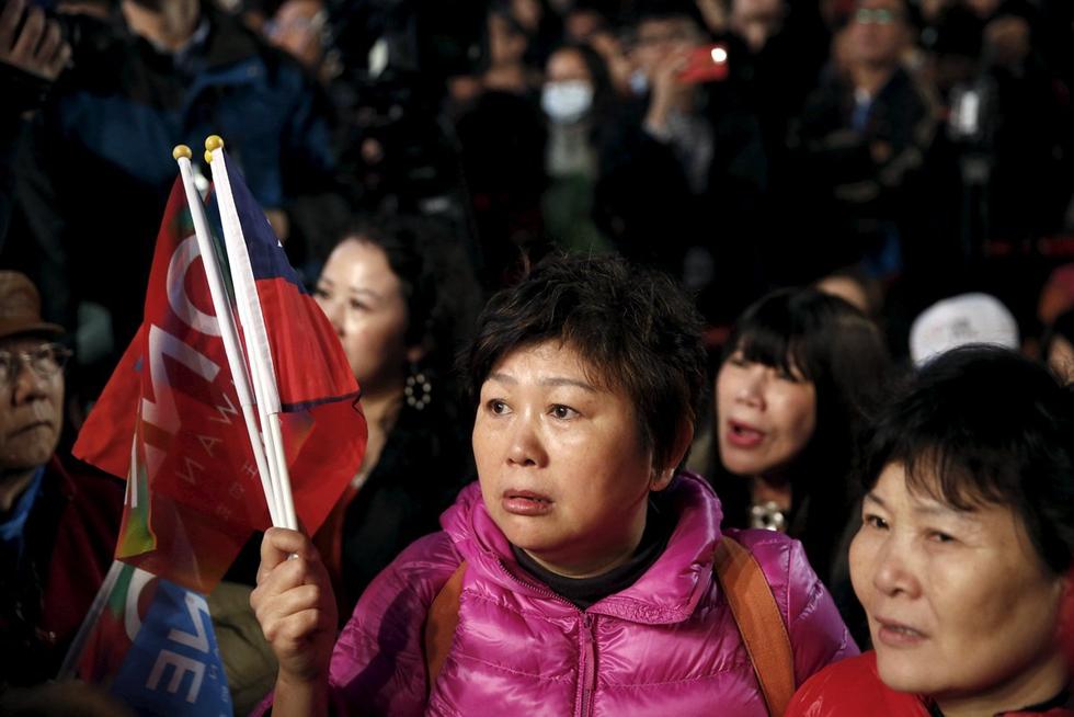 选举结果出炉后，国民党支持者神情低落。