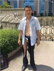 广西律师遭打变“半裸” 法院：是裤子脱线了
